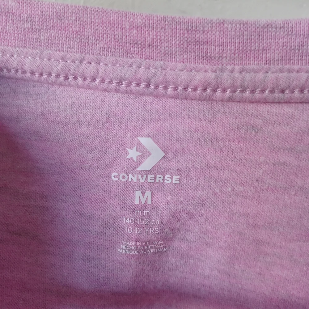 Converse light pink